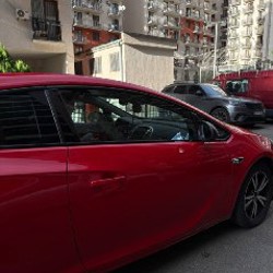 Opel Astra GTC J - фото 8