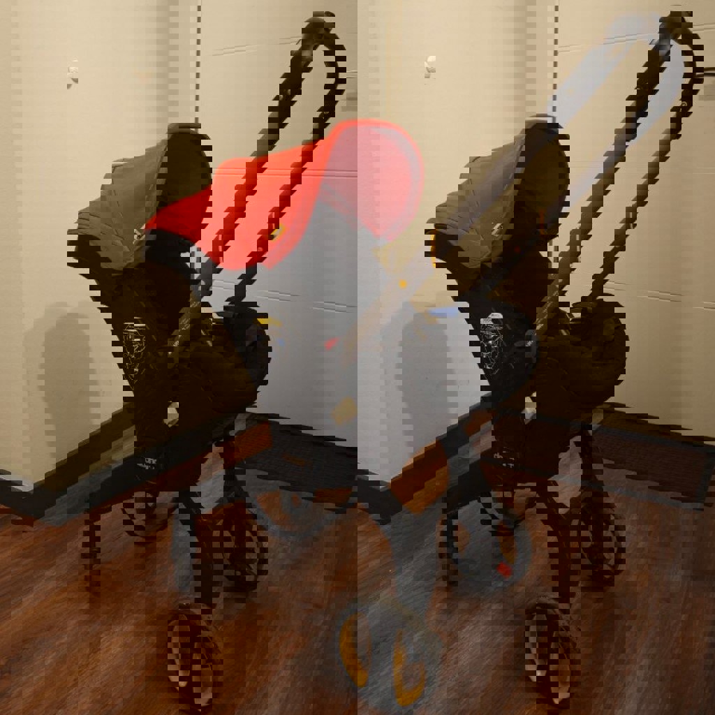 Детское автокресло-коляска Doona