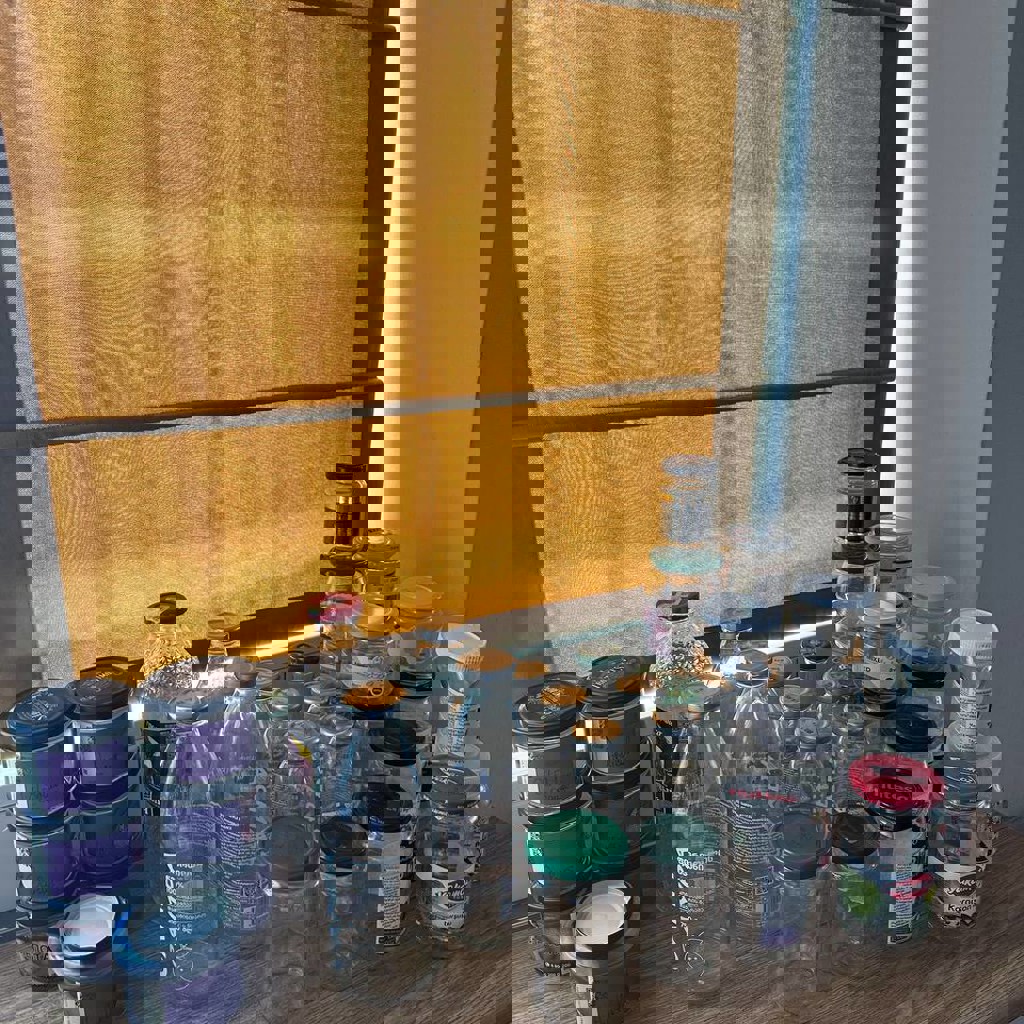 Стеклянные баночки и бутылки