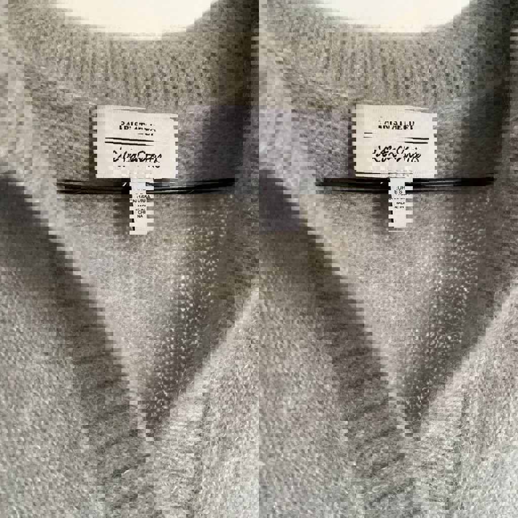 Вязаная жилетка