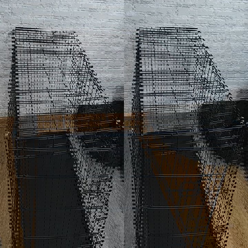 Металлическая клетка для собак