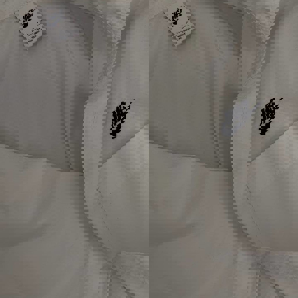 Спортивная белая рубашка Nike