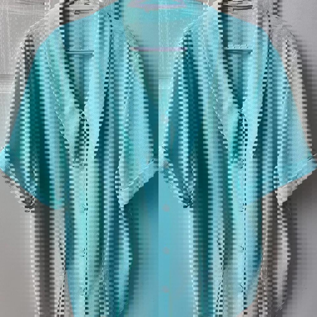 Бирюзовая блузка