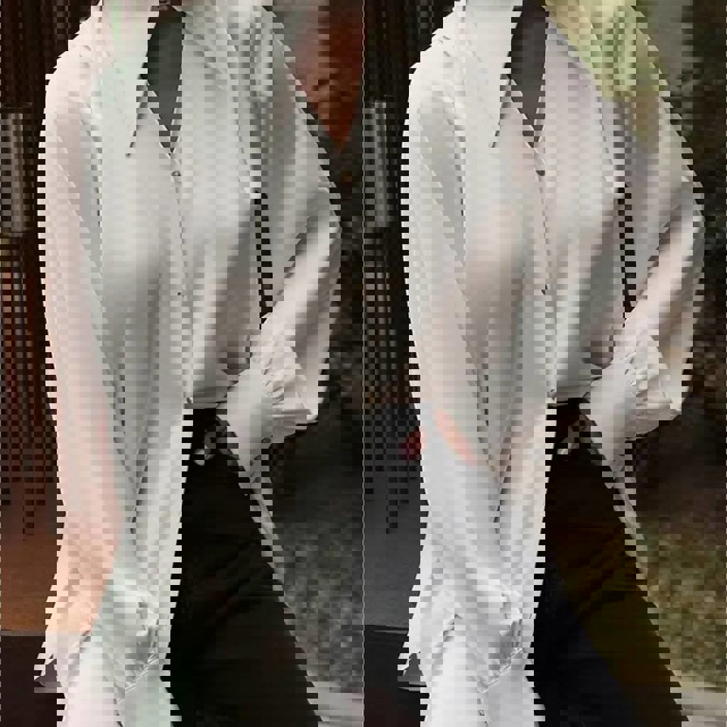 Белая женская рубашка с остроконечным воротником