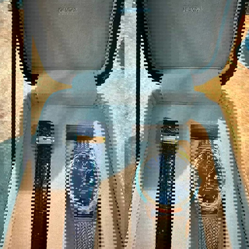 Часы Циколия