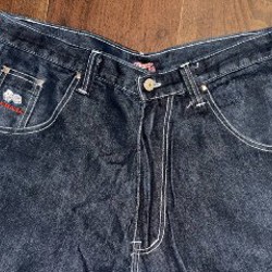 Широкие джинсы - фото 3