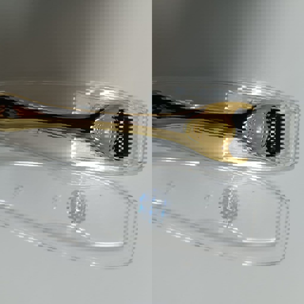 Ролик для лица с иголками