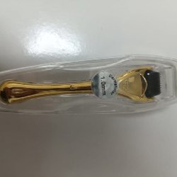 Ролик для лица с иголками - фото 2