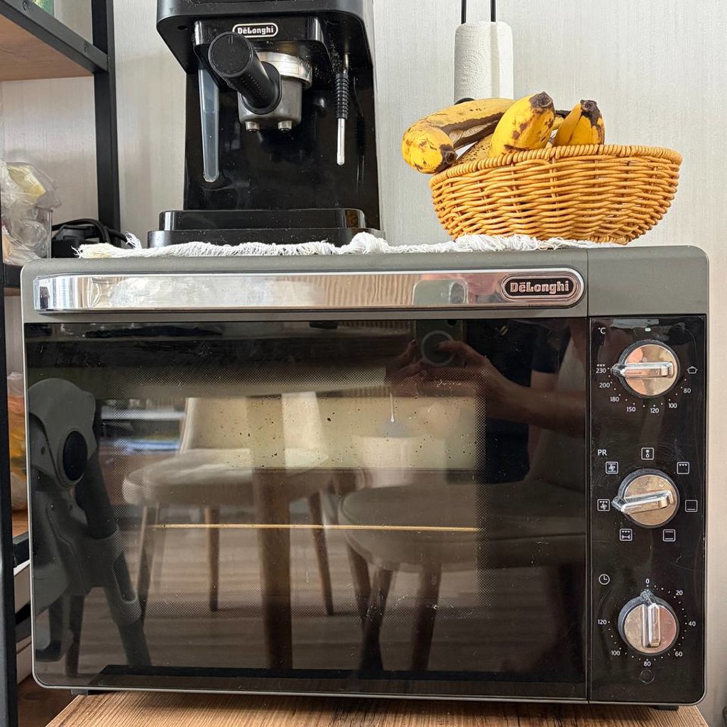 Электрическая духовка Delonghi