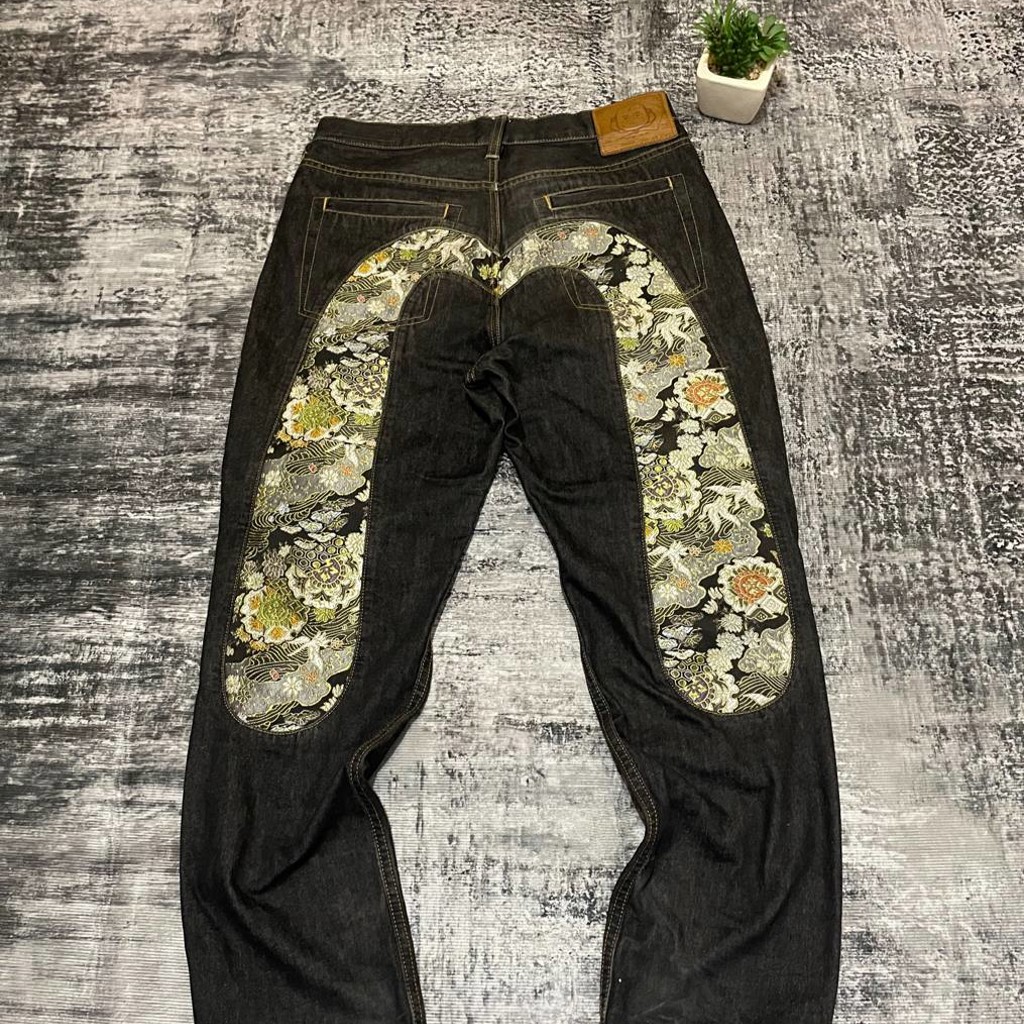 Джинсы Evisu