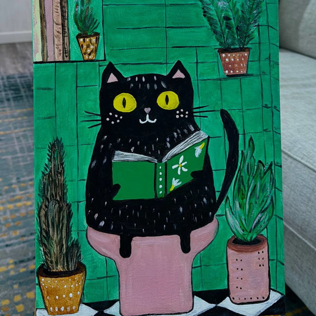 Котэ на унитазе