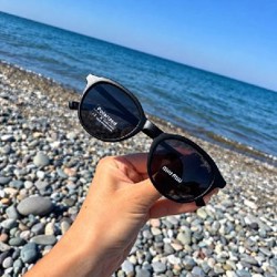Солнцезащитные очки Miu Miu - фото 4