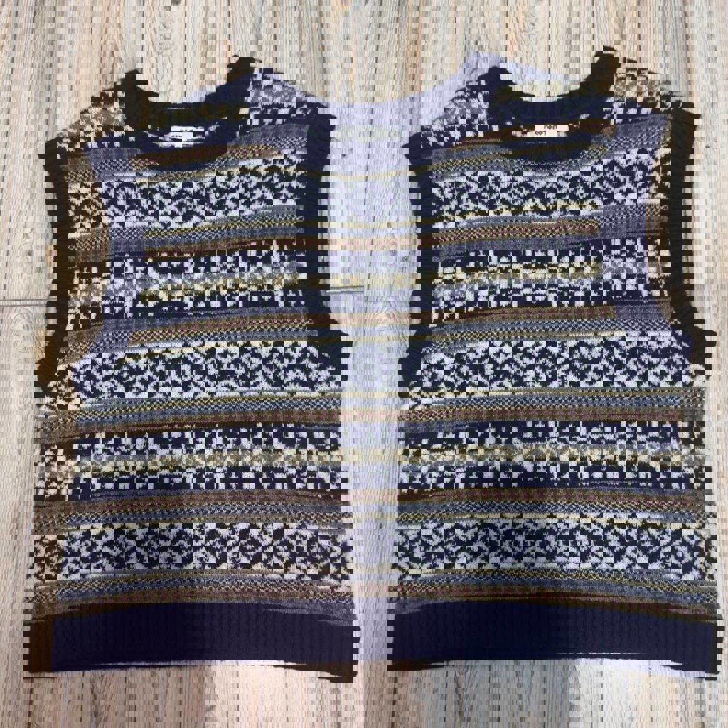 Вязаная жилетка