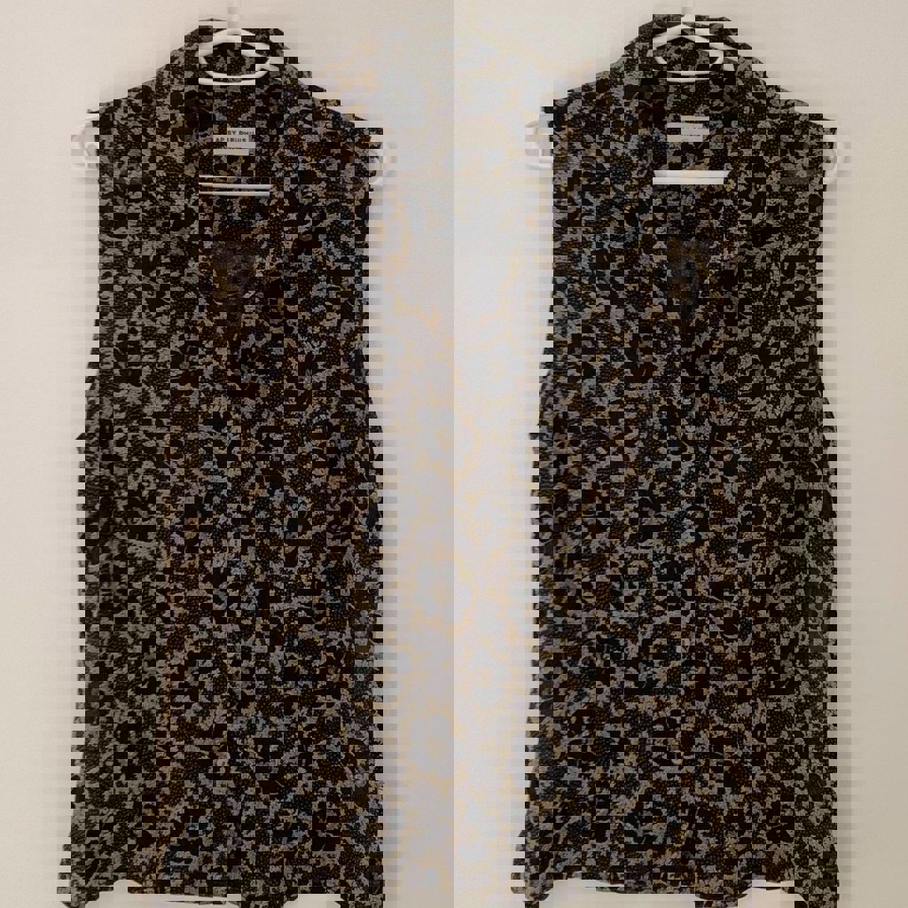 Блузка без рукавов