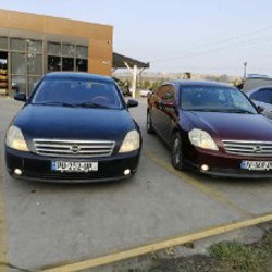 Ниссан бордовый - фото 1