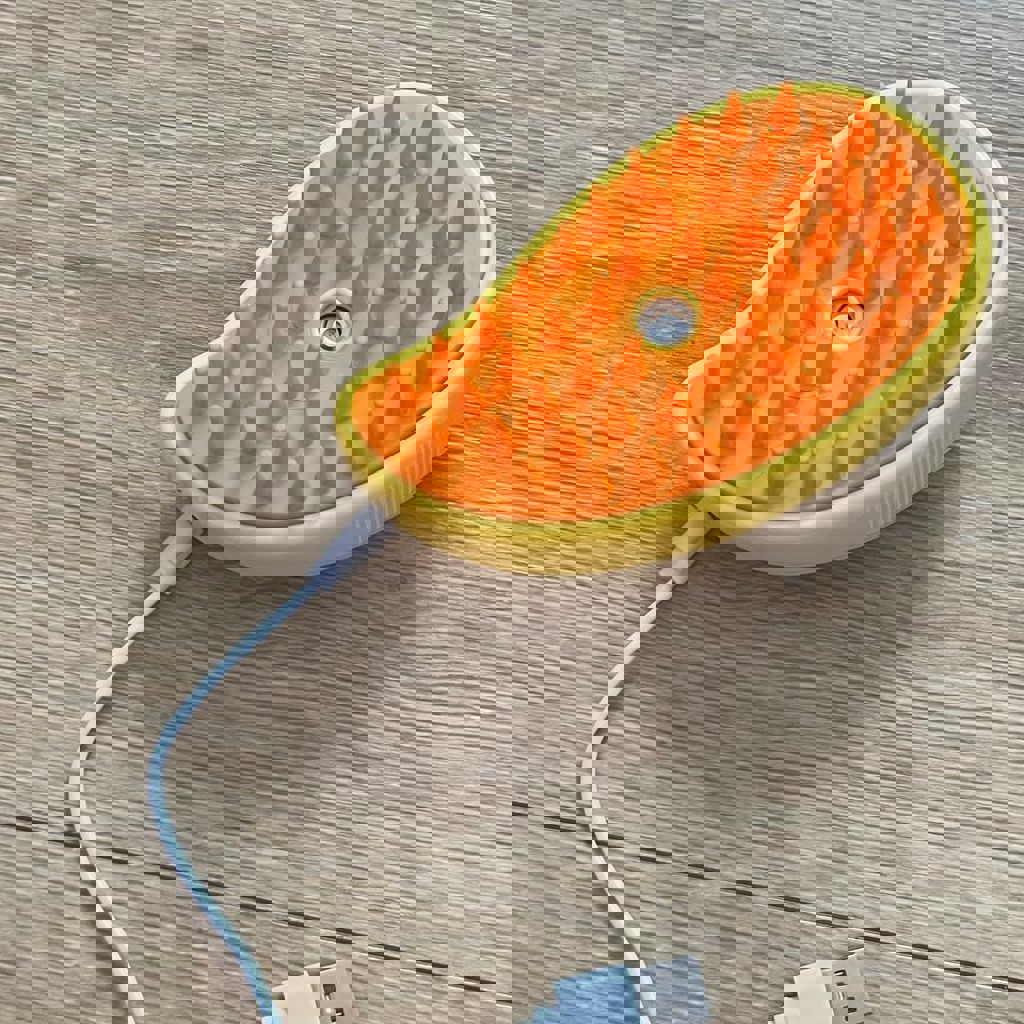 Расческа для животных с подачей пара