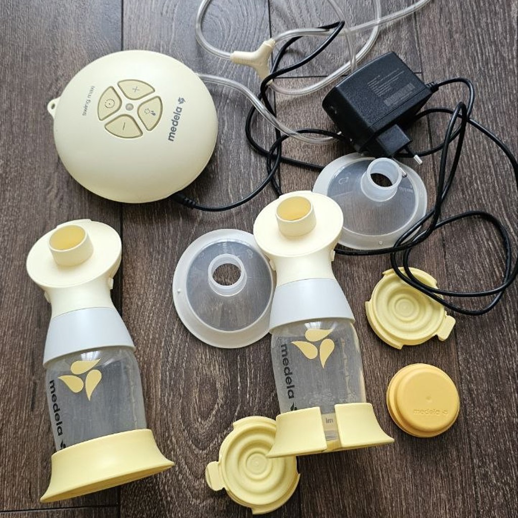 Молокоотсос Medela