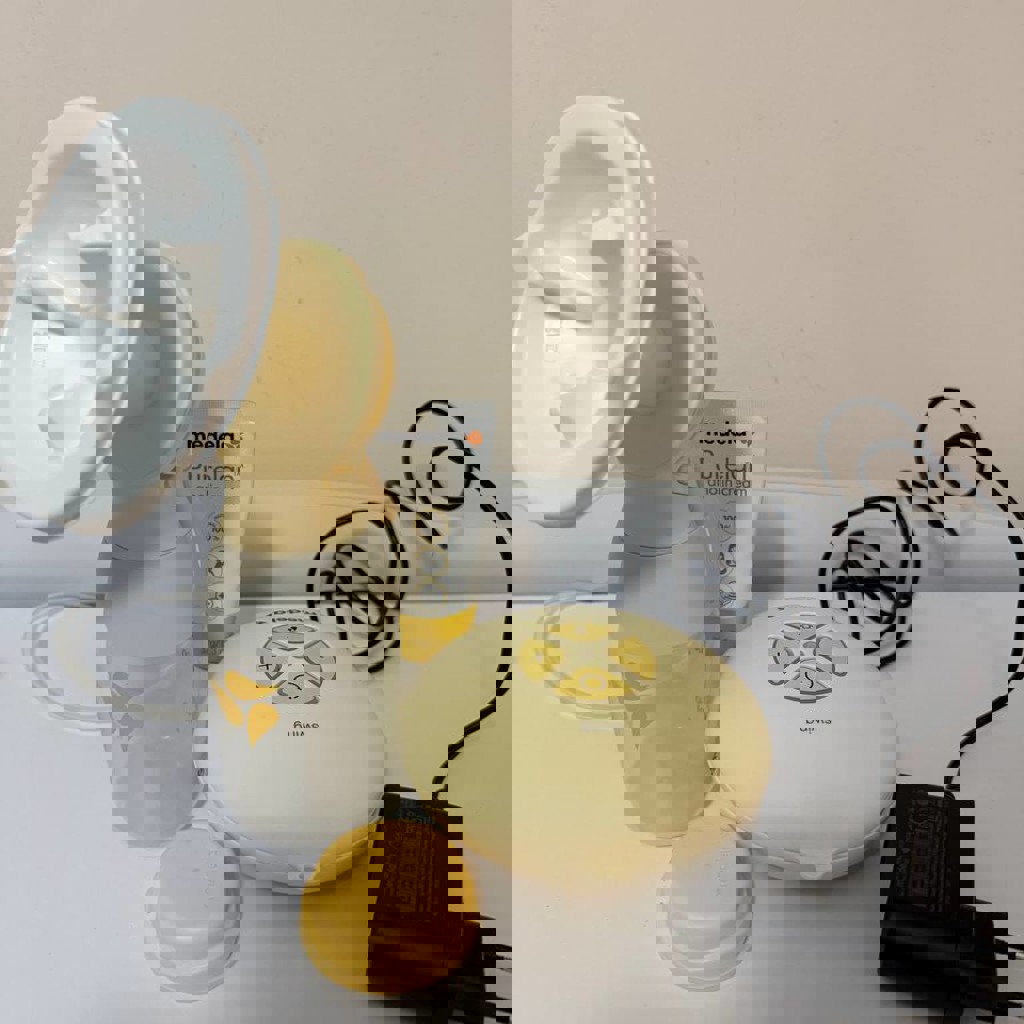 Молокоотсос Medela