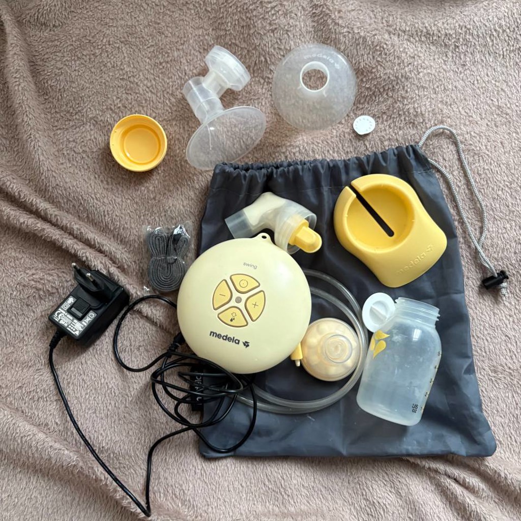 Молокоотсос автоматический Medela