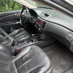 Kia Optima - фото 5