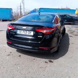 Kia Optima - фото 5