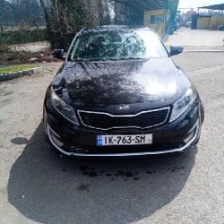 Kia Optima - фото 5