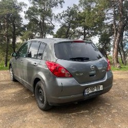 Nissan Tiida - фото 3