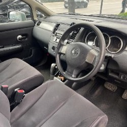 Nissan Tiida - фото 5
