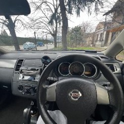 Nissan Tiida - фото 6