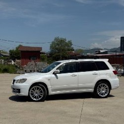 Mitsubishi Airtrek Turbo 2.0 - фото 2