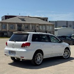 Mitsubishi Airtrek Turbo 2.0 - фото 3