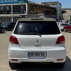 Mitsubishi Airtrek Turbo 2.0 - фото 4