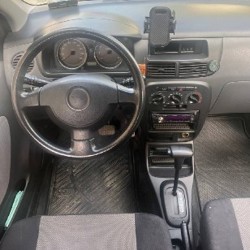 Daihatsu Cuore 2004 - фото 2