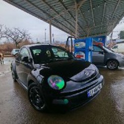 Volkswagen new beetle - фото 2