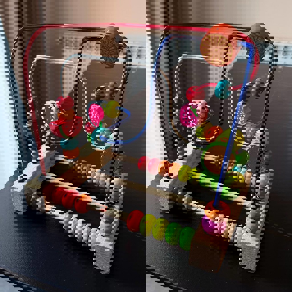 Развивающая игрушка с бусинами