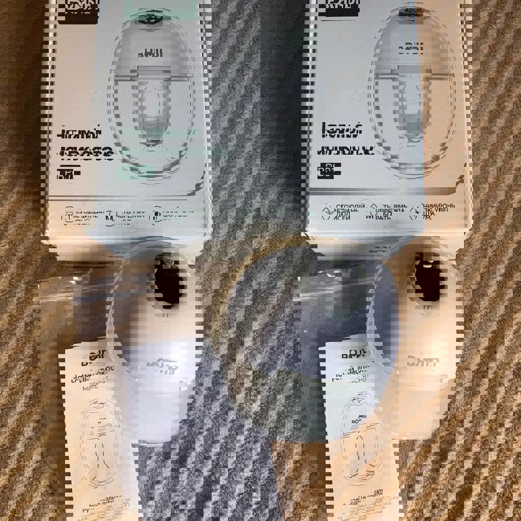 Носимый молокоотсос Bomidi