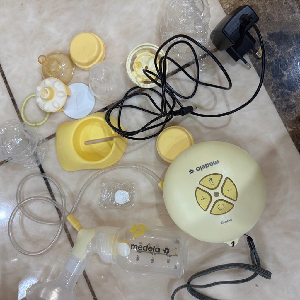 Молокоотсос Medela