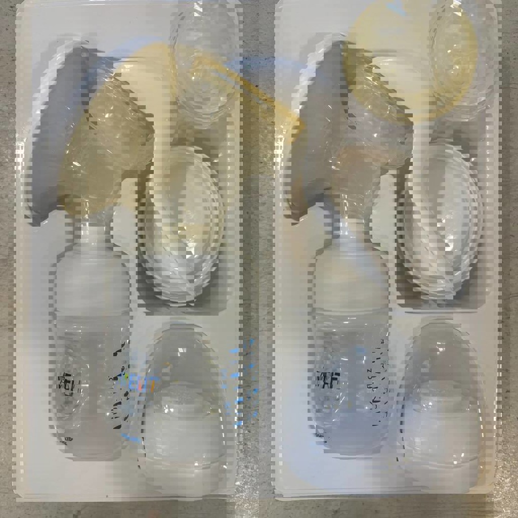 Ручной молокоотсос